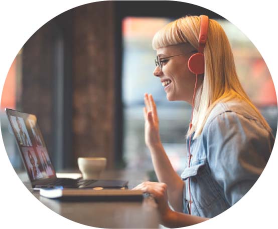 Young woman waving on a video conference call